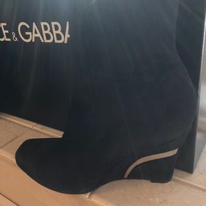 Tall black suede boots